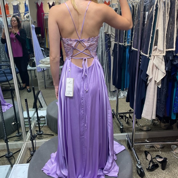 BEAUTIFUL lilac grad dress. Size XS. Brand new with tags. - Picture 2 of 2